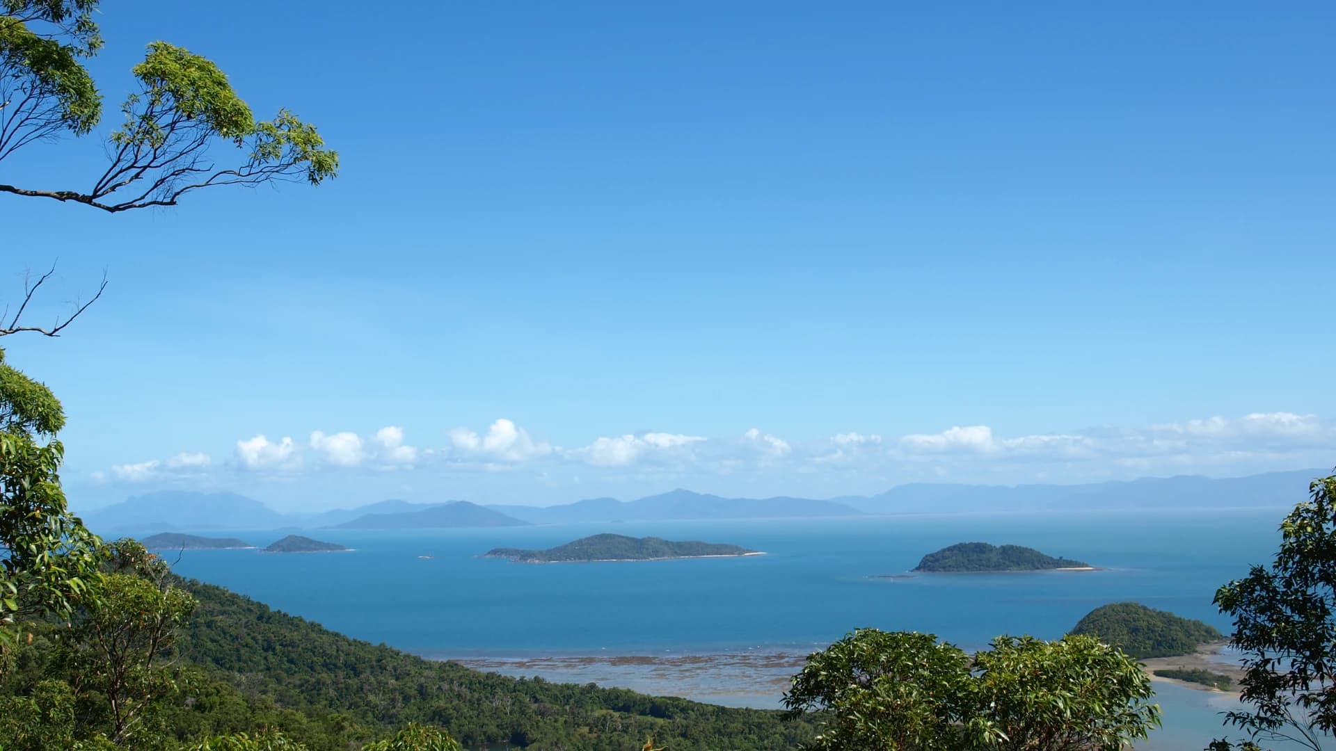 View over the Family Islands, small rainforest-covered islands off Mission Beach, Queensland, Australia
